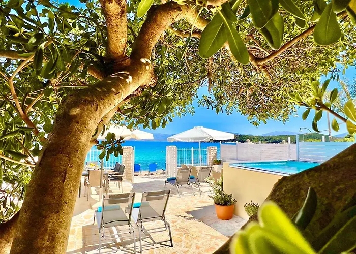 Beachfront House Christina With Private Heatable Pool By Dadovillas Vilă Kassiopi